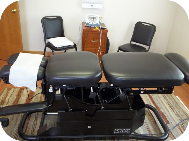 Chiropractor performing a spinal adjustment on a patient at Lombardi Chiropractic in Erie PA